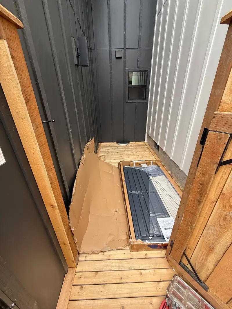 Before: Side-yard storage shed